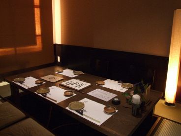 くし路 南興ビル店 炭焼炉ばたの雰囲気1