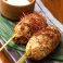 料理メニュー写真 自家製つくね串焼き温玉のせ(一串)
