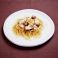 料理メニュー写真 牛すじと白いきのこの焼きクリームソース