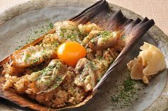 料理メニュー写真 たっぷり漬けマグロの竹皮焼き飯