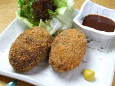 料理メニュー写真 牛肉と杜仲高麗豚のジューシーメンチカツ【限定】