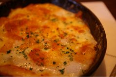料理メニュー写真 帆立と木の子の餅入りとろーりグラタン