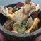 料理メニュー写真 魚介たっぷりの石焼きパエーリャ