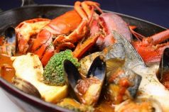 料理メニュー写真 オマール海老と野菜のトマトソース煮込み’ズッパ ディ ペッシェ’