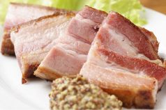 料理メニュー写真 鶏モモとキノコのガーリック焼き/厚焼きベーコン