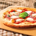 料理メニュー写真 耳までチーズのマルゲリータピザ