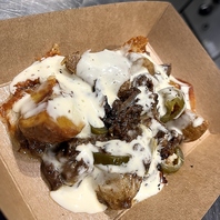 Slash/Dot.名物、無水エゾ鹿ラグーのローデッドポテト