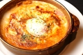 料理メニュー写真 温泉卵のせミートドリア