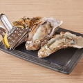 料理メニュー写真 殻付き牡蠣バター焼き2ピース