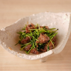 砂肝と豆苗の生胡椒炒め