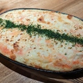 料理メニュー写真 山芋鉄板の明太チーズ焼き