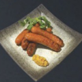 料理メニュー写真&nbsp;黒豚ソーセージの炭火焼