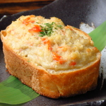 オープンからの大人気メニュー！！本ずわい蟹のガーリックカニマヨトースト