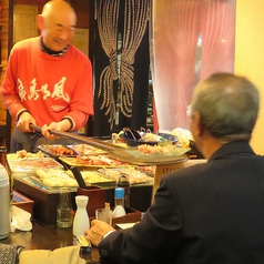 炉端焼きを大きな「しゃもじ」で提供致します!!!の写真