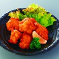 料理メニュー写真 若鶏の唐揚げ/焼きイカ　醤油風味