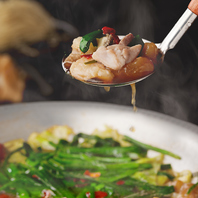 「ぶあいそ名物のもつ鍋」