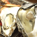 料理メニュー写真 殻付き焼牡蠣