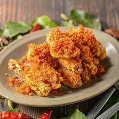 【アジアンスパイシーチキンウィング】毛沢東スパイスで和えた手羽中《990円(税込)》の写真