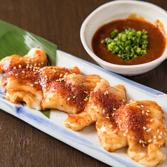 【自家製の赤味噌ねぎテッチャンの濃厚な旨味】赤味噌ねぎテッチャン　539円(税込)の写真