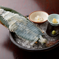 【名物】いけす泳ぎの活きイカの写真