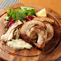 料理メニュー写真 折爪三元豚 “佐助” バラ肉のポルケッタ
