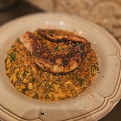 タコ足の炭焼きメロッソ(スペイン風リゾット)