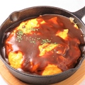 料理メニュー写真 鉄板デミグラスソースオムライス