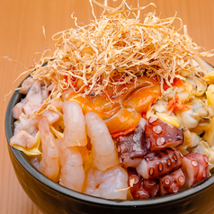 こだわりの出汁が香るもんじゃ焼き！の写真