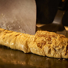 鉄板仕立てのだし巻き卵