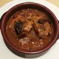 料理メニュー写真 若鶏とポルチーニ茸のエスパニョーラソース煮