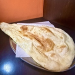 チーズ・ジャガイモ・ガーリックなどカレーにぴったりのナンも種類豊富！プレーンナンのおかわり無料