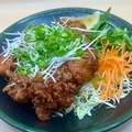 料理メニュー写真&nbsp;鶏ももの唐揚げ ネギソースかけ