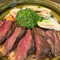 料理メニュー写真&nbsp;牛サガリステーキと生マッシュルーム。香草バターのパエリア