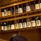圧巻の日本酒棚！常時60種あります。飲み放題は40種以上ご用意しております。