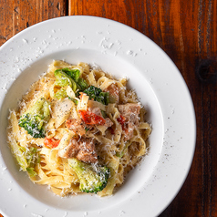 豚バラ肉の白ワイン煮込みと季節野菜のラグーソース タリアテッレ