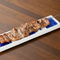 料理メニュー写真 博多のTHE豚バラ串　1本