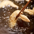 料理メニュー写真 【名物】金澤手羽先 (1本)