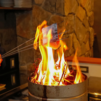 厳選食材を豪快な炎で調理する本格派
