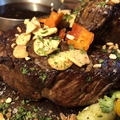 料理メニュー写真 黒毛和牛のステーキにんにく醤油
