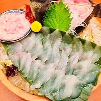 圧巻の歯ごたえ！生簀から捌く極上活イカと厳選地酒