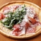 イタリア産リコッタチーズとチェリートマトの包み焼きピッツァ「プロシュート・ルッコラ」