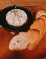 料理メニュー写真 丸ごとカマンベールチーズのアヒージョ
