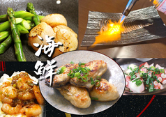 海鮮メニューも豊富！広島県産の大粒牡蠣を使った、カキのバターソテーは味わうべし！の写真