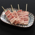 料理メニュー写真&nbsp;炭香る自慢の一本！ジューシーな脂の甘みと旨味が口いっぱいに広がる、博多の夜に欠かせない極上の豚バラ。