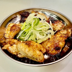 西成風！大トロホルモン焼