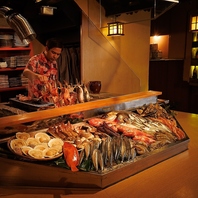 厳選素材を炉端の火で豪快に焼き上げる、格別な一皿。