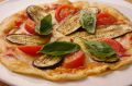 料理メニュー写真 ルッコラとナス・トマトの手作りナポリピッツァ