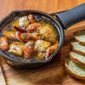 料理メニュー写真 Chorizo Sausage and Potato Ajillo チョリソーソーセージとポテトのアヒージョ