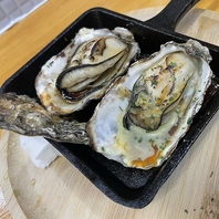 旨み際立つ蒸し牡蠣のネギソース
