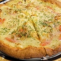 料理メニュー写真&nbsp;土佐の極旨トマトのアンチョビ風味のピザ